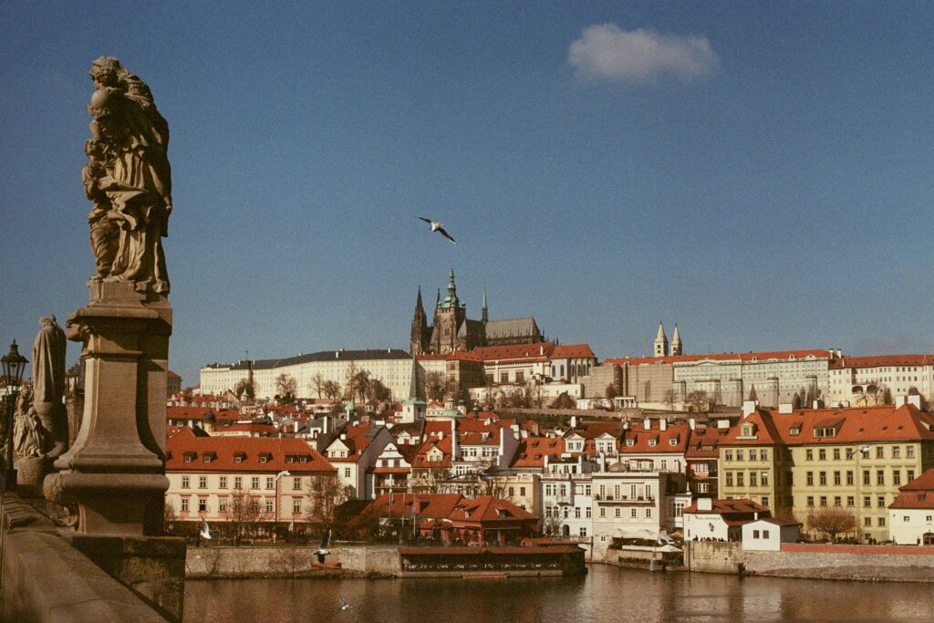Scenic view of Prague Castle and Charles Bridge in Prague, Czechia, captured on a clear day.